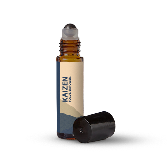 Kaizen essential oil roller bottle on a transparent background.