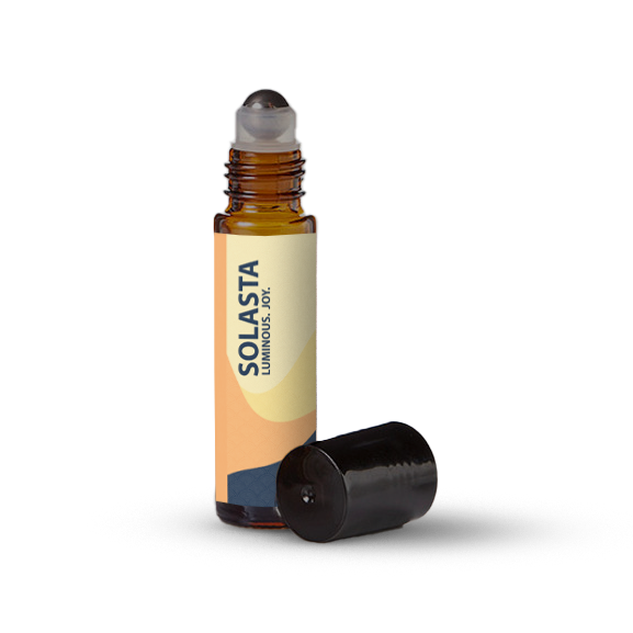 Solasta essential oil roller bottle on a transparent background.