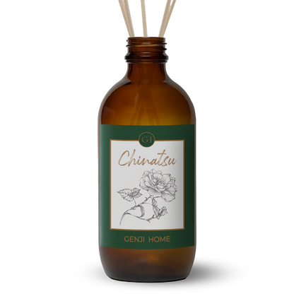 Brown diffuser bottle with green label featuring a rose illustration and 'Genji Home' branding on a transparent background.
