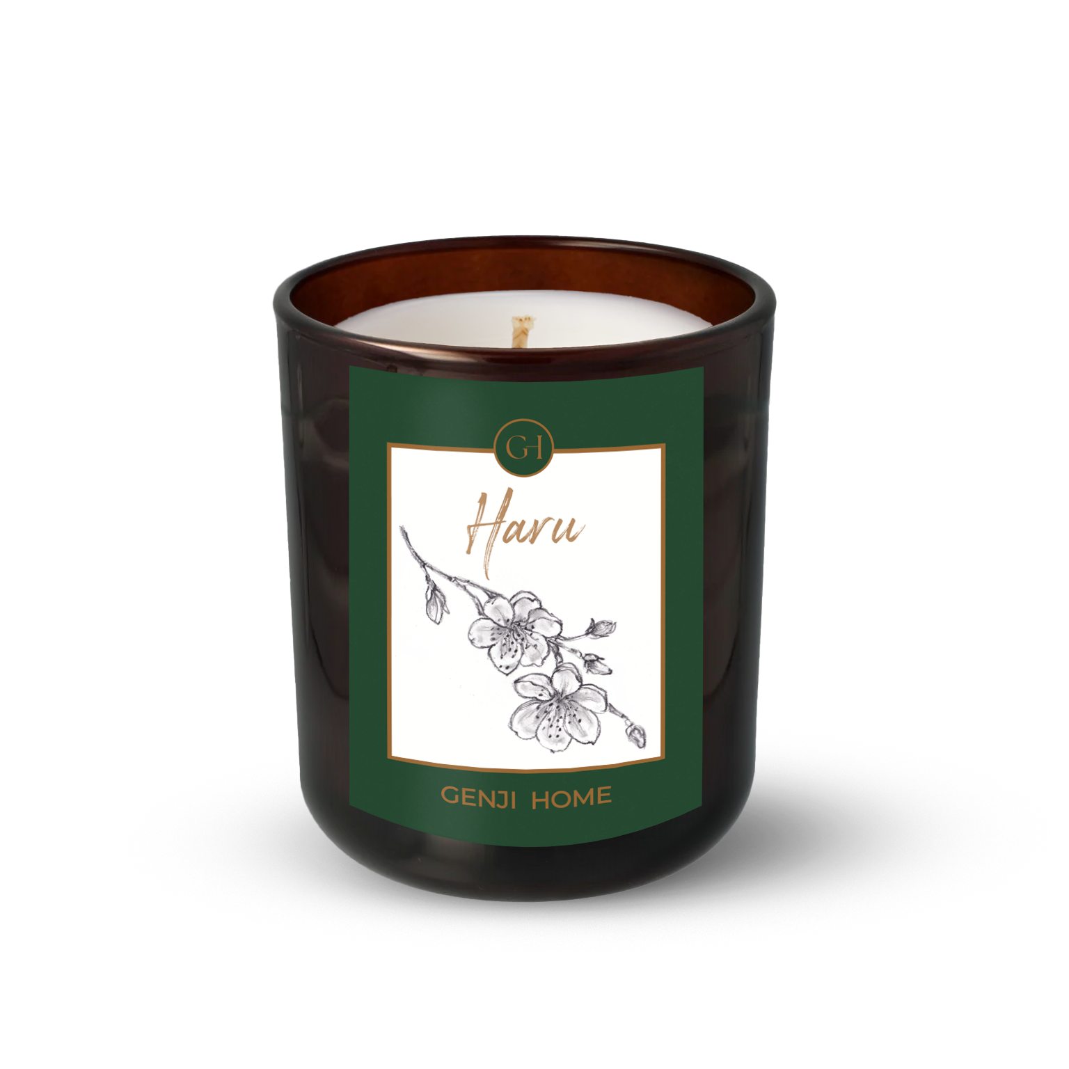 Haru Olive Wax Candle by Genji Home  in a amber glass container with a green label featuring 'Genji Home' branding.