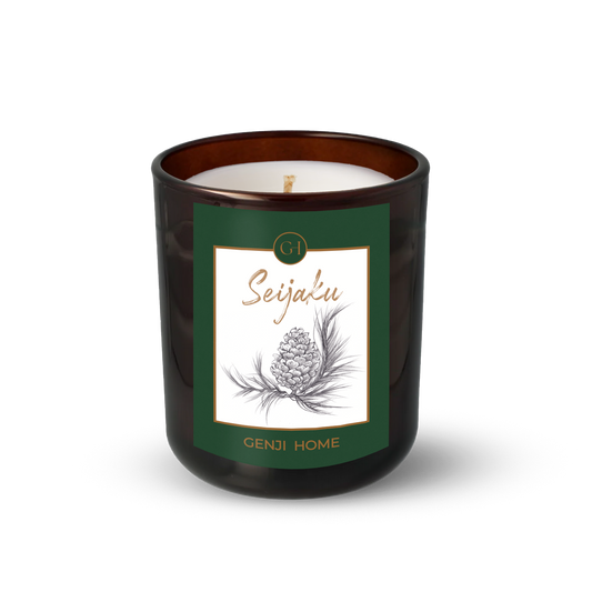 Seijaku Olive Wax Candle by Genji Home  in a amber glass container with a green label featuring 'Genji Home' branding.