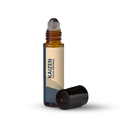 Kaizen essential oil roller bottle on a transparent background.