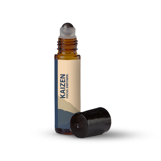 Kaizen essential oil roller bottle on a transparent background.