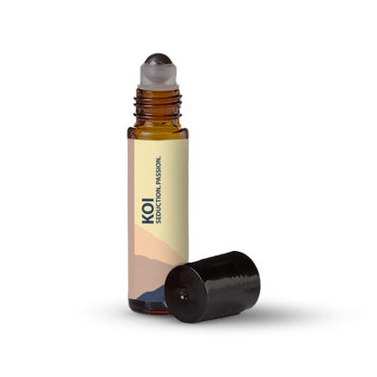 Koi essential oil roller bottle on a transparent background.