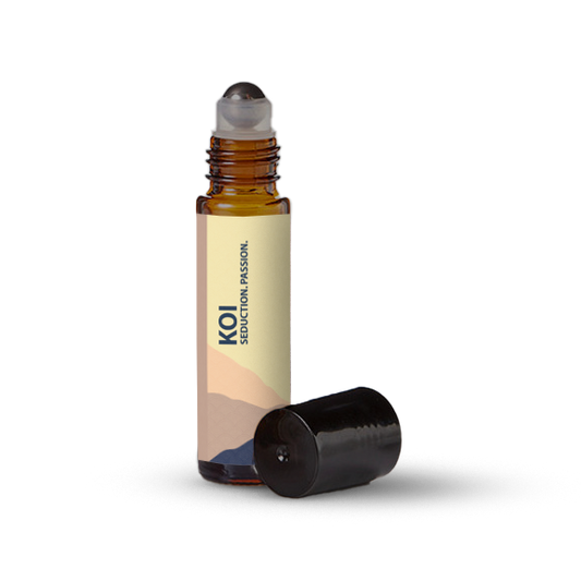 Koi essential oil roller bottle on a transparent background.