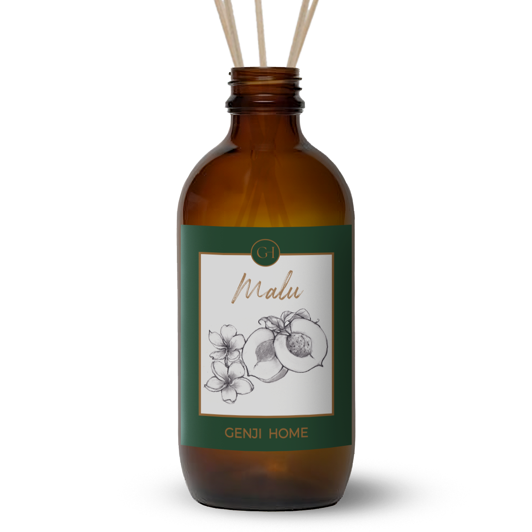 Brown diffuser bottle with green label featuring floral and fruit design and 'Genji Home' branding on a transparent background.