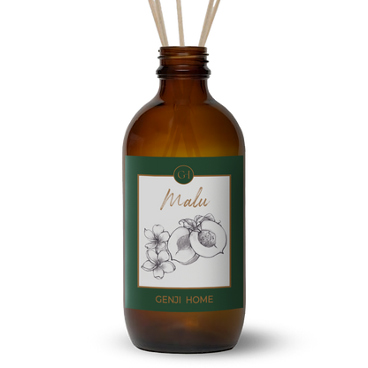 Brown diffuser bottle with green label featuring floral and fruit design and 'Genji Home' branding on a transparent background.
