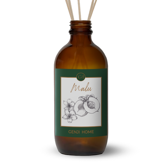 Brown diffuser bottle with green label featuring floral and fruit design and 'Genji Home' branding on a transparent background.