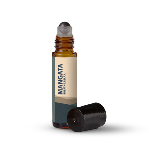 Mangata essential oil roller bottle on a transparent background.
