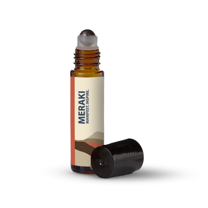 Meraki essential oil roller bottle on a transparent background.