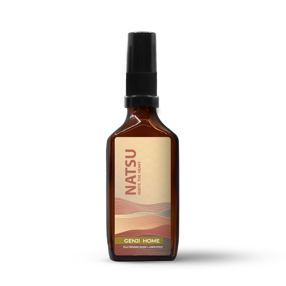 Natsu room and linen spray by Genji Home in an amber bottle on a transparent background.