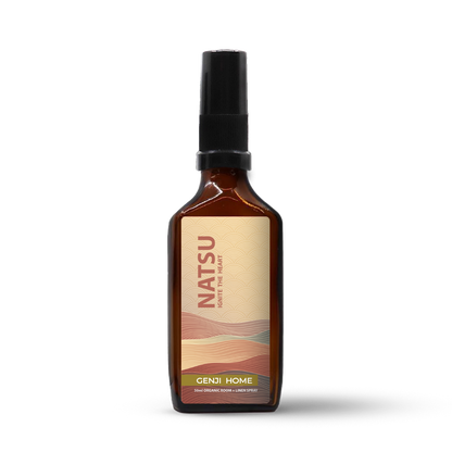 Natsu room and linen spray by Genji Home in an amber bottle on a transparent background.