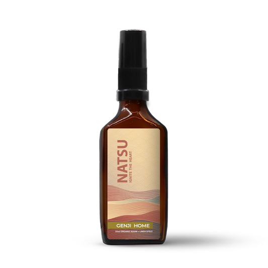 Natsu room and linen spray by Genji Home in an amber bottle on a transparent background.