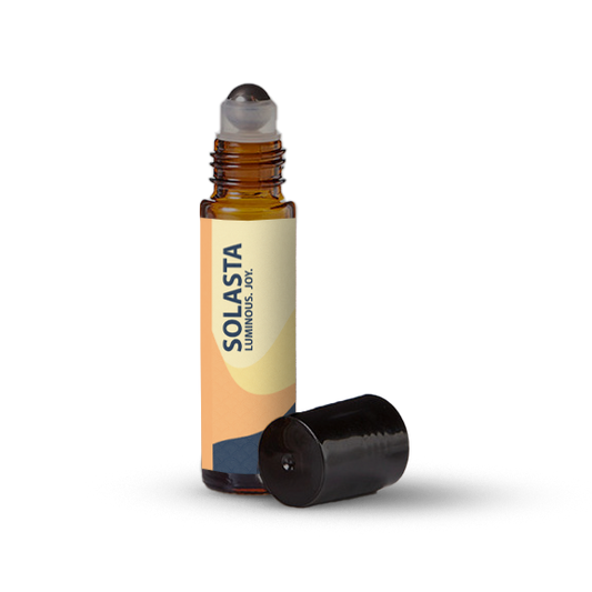 Solasta essential oil roller bottle on a transparent background.